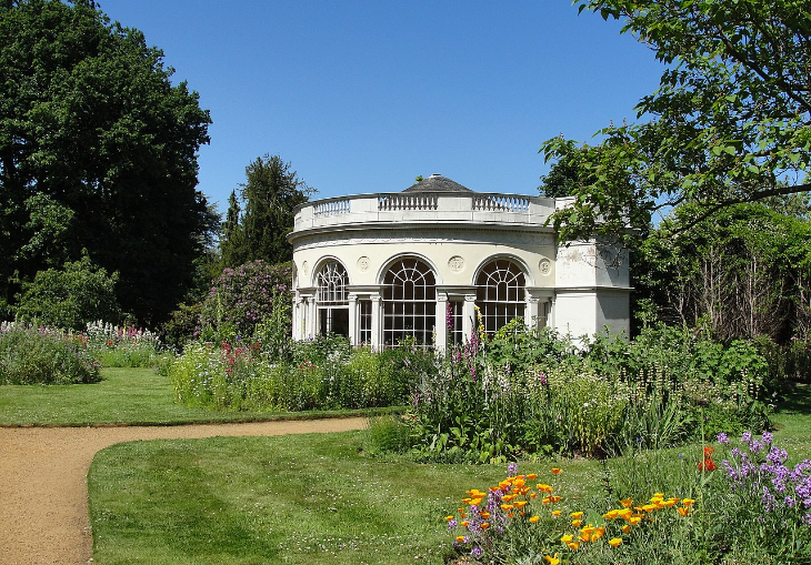 Best London gardens to visit: colourful flowers in front of a round building
