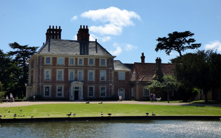 Best things to do in outer London:  the exterior of manor house Forty Hall, viewed from across a pond