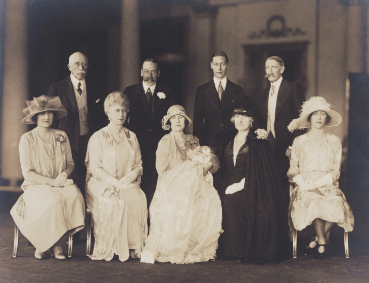What's on in London in April 2026: an historic photo of Queen Elizabeth II on her christening, held by her mother and surrounded by other relatives