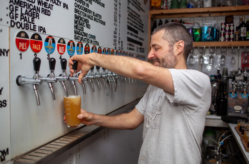 Easter weekend events in London: a man pouring a pint at a beer festival