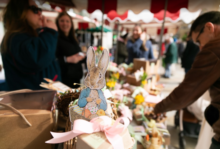 Top events in London today:  a cardboard cutout of Peter Rabbit on a stall at a market