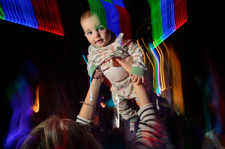 Things to do in London today: a baby being lifted into the air