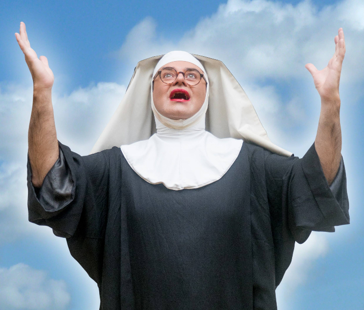 Things to do in London today:somebody dressed as a nun, raising their hand skywards