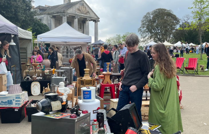 Top events in London today: people browsing stalls at an outdoor market in front of Beckenham Place Mansion