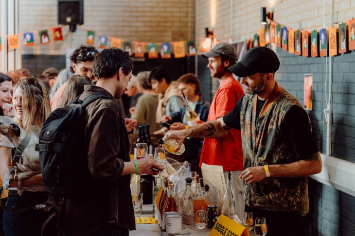 What's on in London in April 2026: visitors being poured wine at stalls at a wine fair