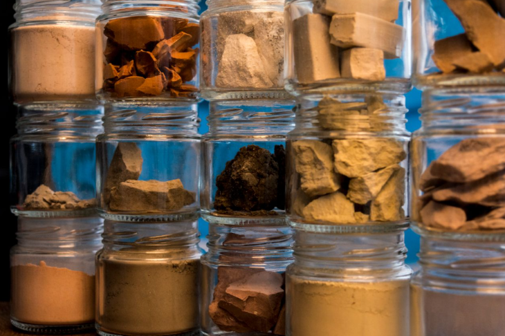 This weekend in London: a stack of glass jars containing different earth specimens