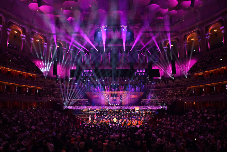 An Albert Hall flooded in pueple light