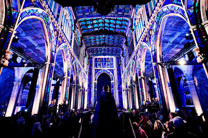 A church illuminated magically in blue