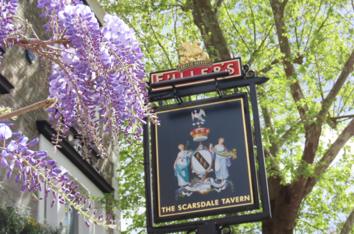 Wisteria walking route in London mapped: the Scarsdale Tavern pub sign, with wisteria in the foreground