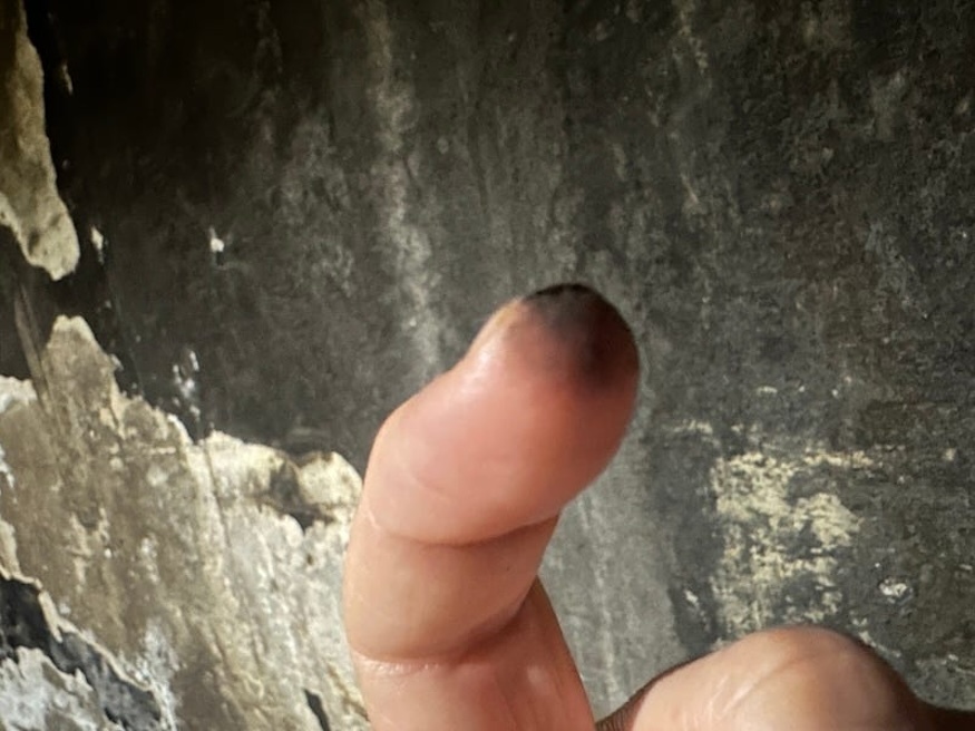 Soot on a finger