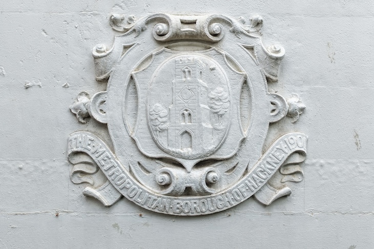 an emblem showing the borough of hackney logo