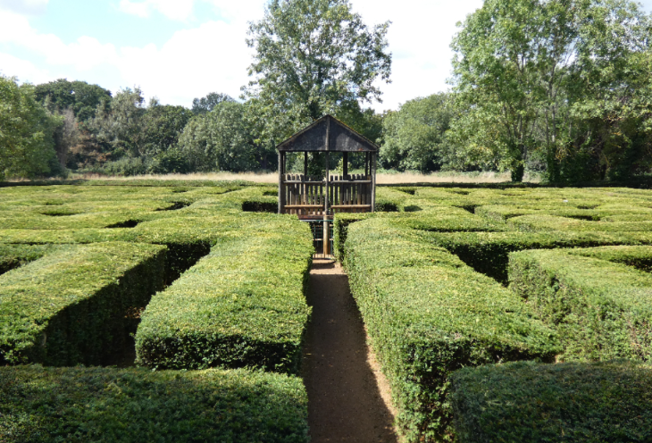 Things to do in London in half term May 2026: a maze made from hedges, with a wooden platform in the centre