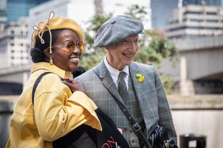 What's on in London this weekend: two people wearing hats posing for a photo together