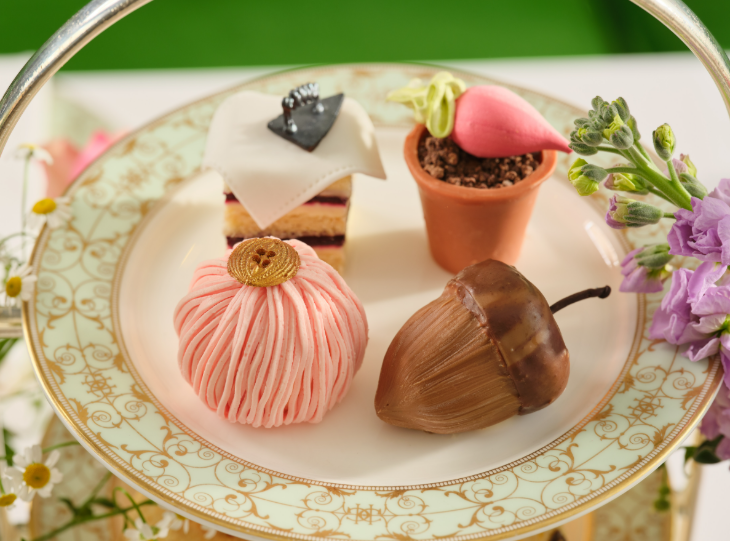 Things to do in London today: four pastries, including one shaped like an acorn, presented on a decorative plate