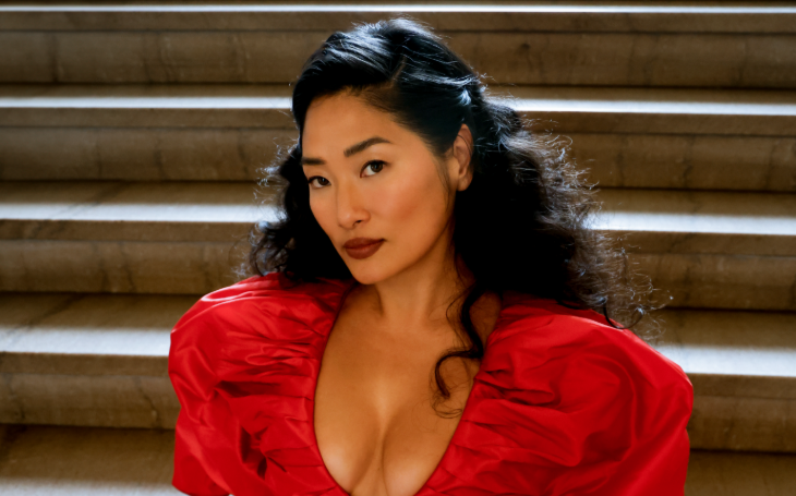 Top events in London today: Chloe Flower, sitting on some steps in a red dress
