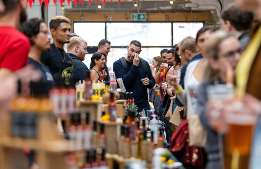 What's on in London this weekend: a man in a crowd wiping his eyes at the Hot Sauce Festival