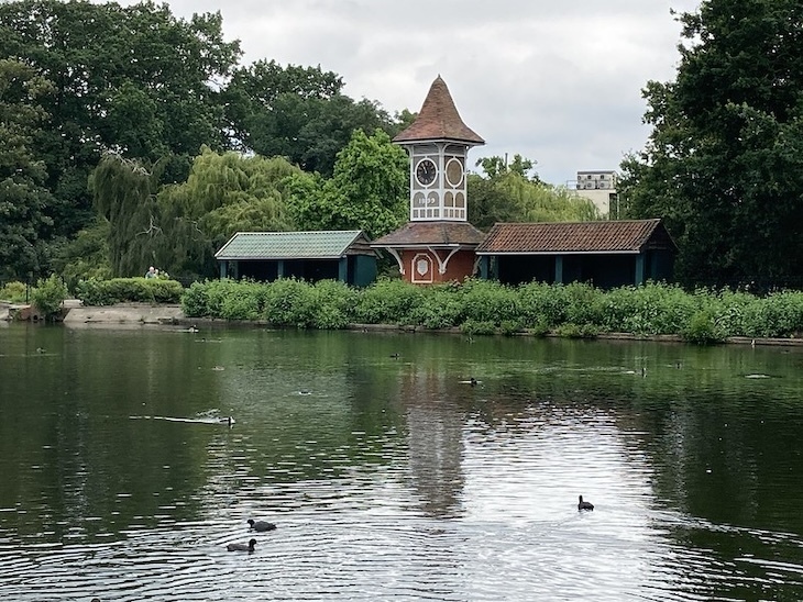 A shot of valentines park in ilford with coots on a lake
