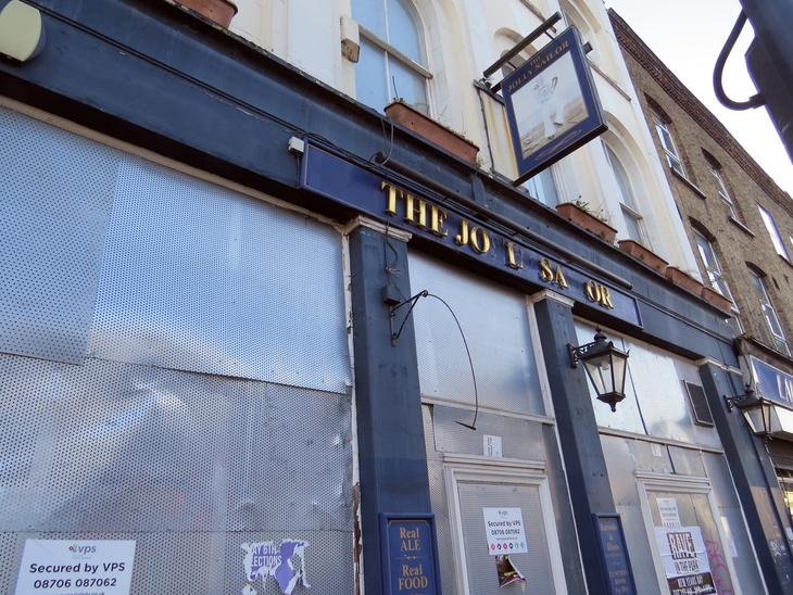 The closed up frontage of the pub