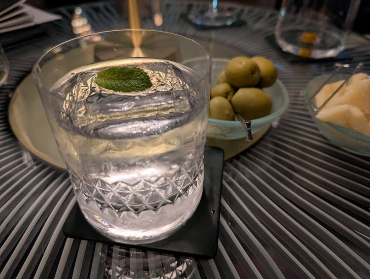 A very clear looking cocktail