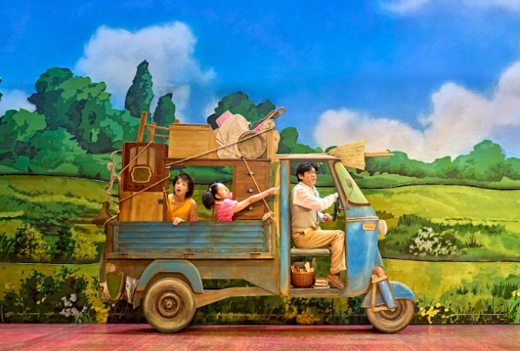 Best family/children's theatre shows in London for summer 2026: a family driving through countryside on a rickshaw in My Neighbour Totoro