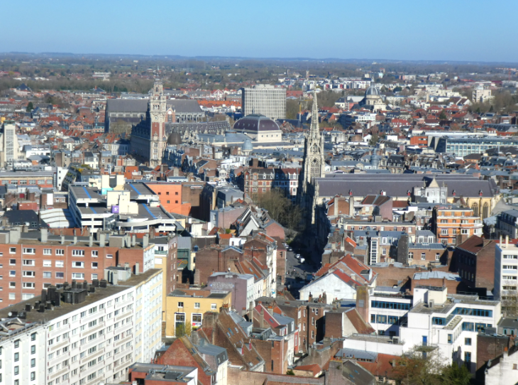 Extreme day trip from London to Lille: view over Central Lille from the clocktower - predominantly modern buildings, with a few older landmarks sprinkled in