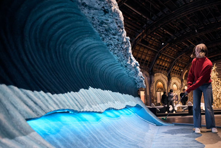 Things to do in London in July 2026: a person tackling a crazy golf hole designed to look like a wave in the sea