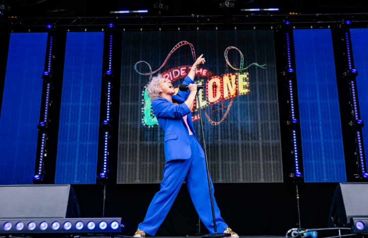Things to do in London today: a singer in a blue suit performing on stage