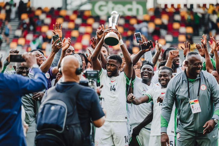 Things to do in London today: a football team holding up a trophy and celebrating