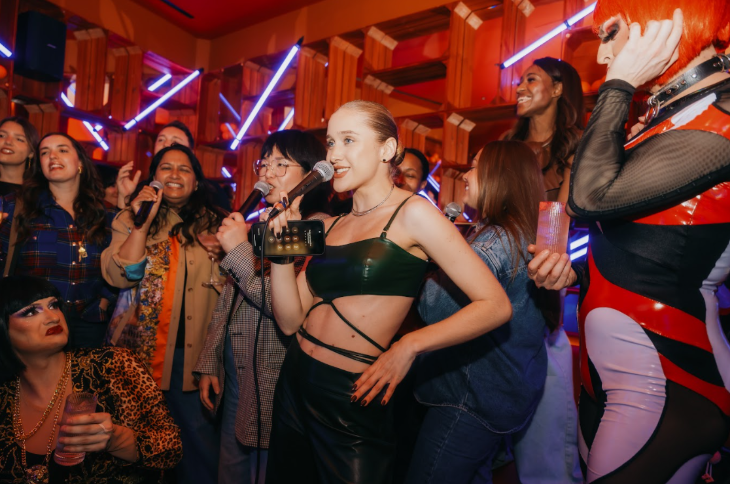 Top events in London this weekend: a group of people doing karaoke together