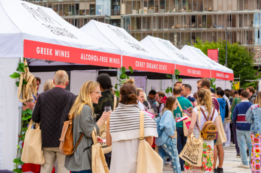 What's on in London this weekend: people wandering among stalls with glasses of wine in their hands