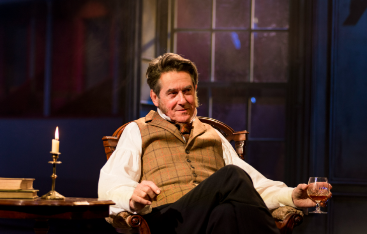 Top events in London today: Adrian Lukis in the role of Mr Wickham, sitting back in a chair with a candle lit next to him and a glass of wine in his hand