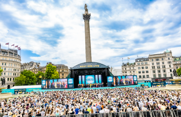 What's on in London in June 2026: huge crowds watching West End Live on a stage in front of Nelson's Column in Trafalgar Square