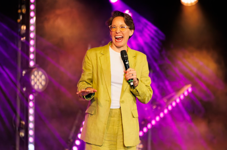 Things to do in London in July 2026: comedian Suzi Ruffell on stage in a yellow suit