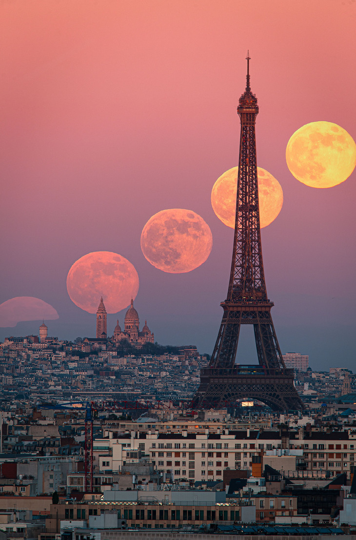 Various moons behind the Eiffel Tower
