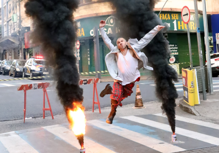 Free things to do in London in the 2026 summer holidays: a person running between flames coming from manhole covers, as if in an action film