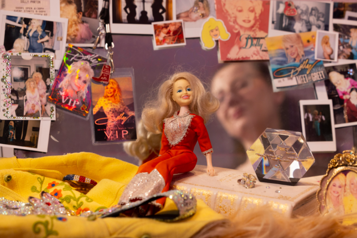 August 2026 in London: a display featuring a Barbie-style doll surrounded by items relating to Dolly Parton