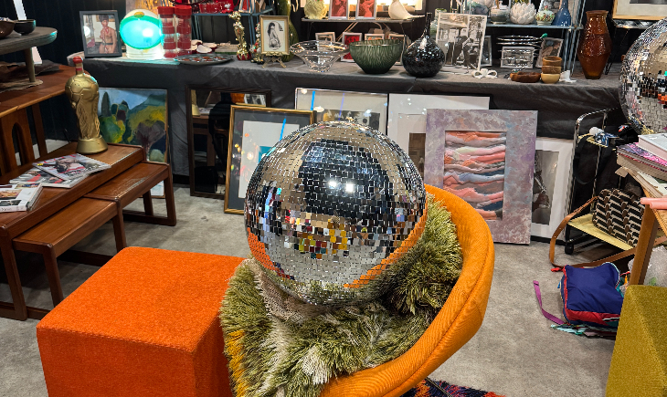 Things to do in London today: a disco ball and other items on display at a flea market