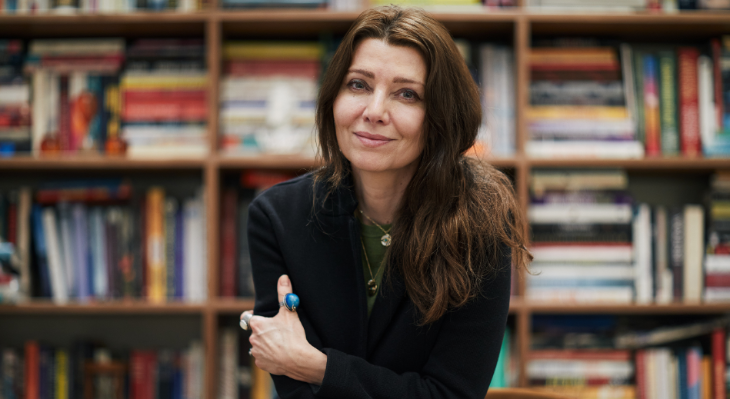Things to do in London this weekend: Elif Shafak in front of a bookshelf