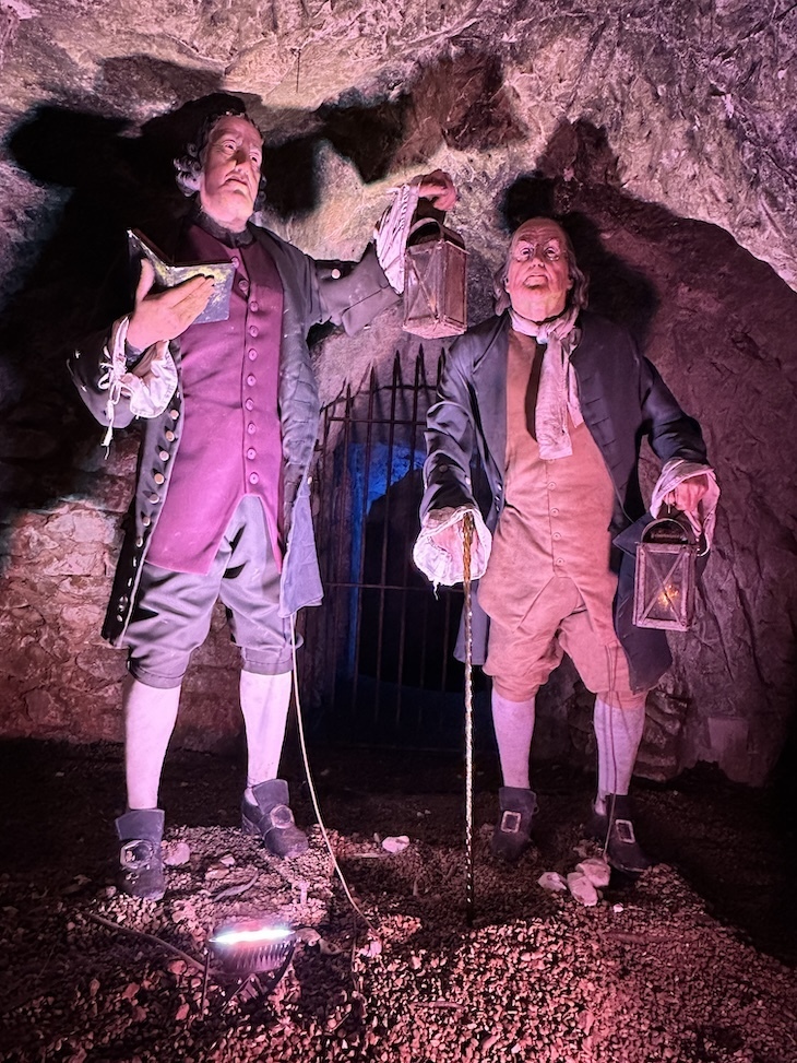 Francis Dashwood and Benjaming Franklin inspecting caves
