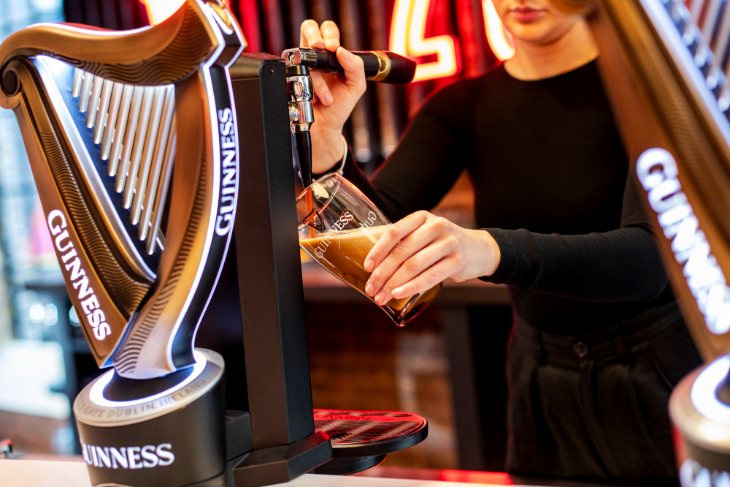 A pint of Guinness being poured