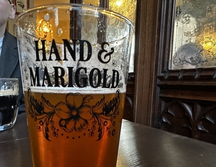 Hand and Marigold pub pint glass