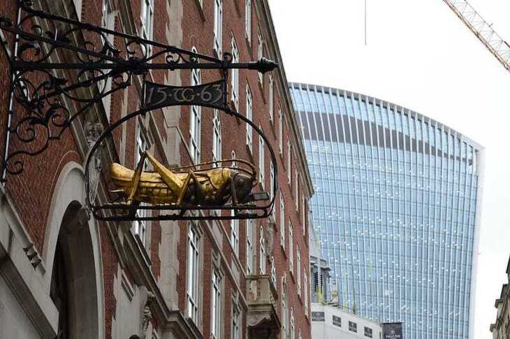 A grasshopper hanging sign, symbol of thomas gresham
