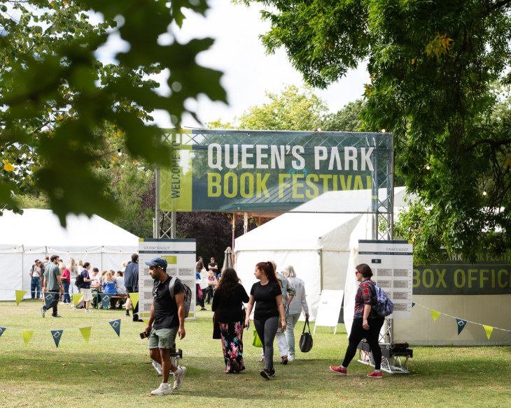 September 2026 things to do in London: a sign over the entrance of Queen's Park Book Festival, in front of several white marquees