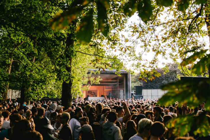 September 2026 top events in London: a festival crowd among trees watching a stage