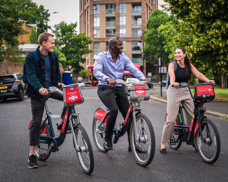 Three people on Santander Cycles
