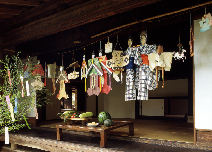 A display of Tanabata dolls hanging up inside a house