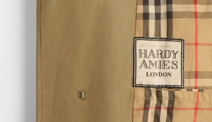 September 2026 top events in London: a close-up photo of part of the interior of a Burberry trench coat, showing a label saying "Hardy Amies London"