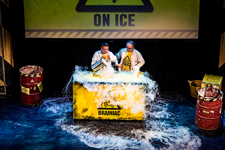 Things to do in London this weekend: two people doing a science experiment which is producing a lot of smoke, live on stage