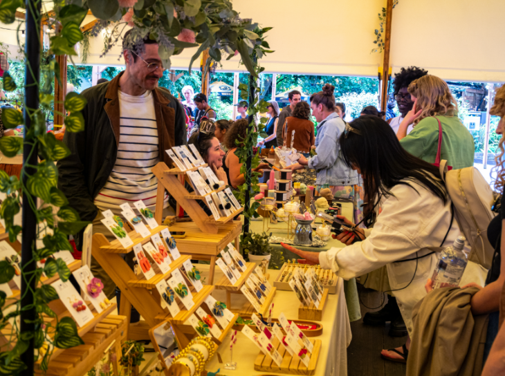 Things to do in London this weekend: people browsing stalls at a craft market