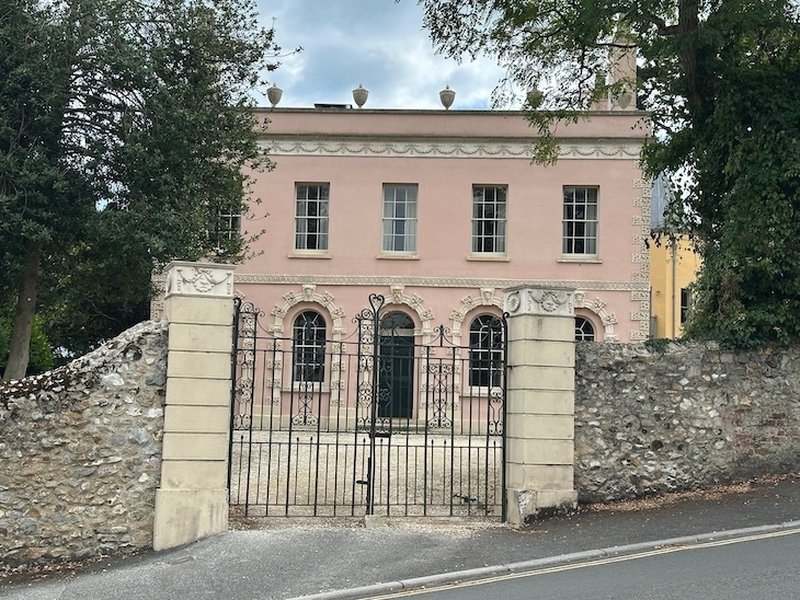 Eleanor Coade's home in Lyme regis, a pink building with stone gateposts
